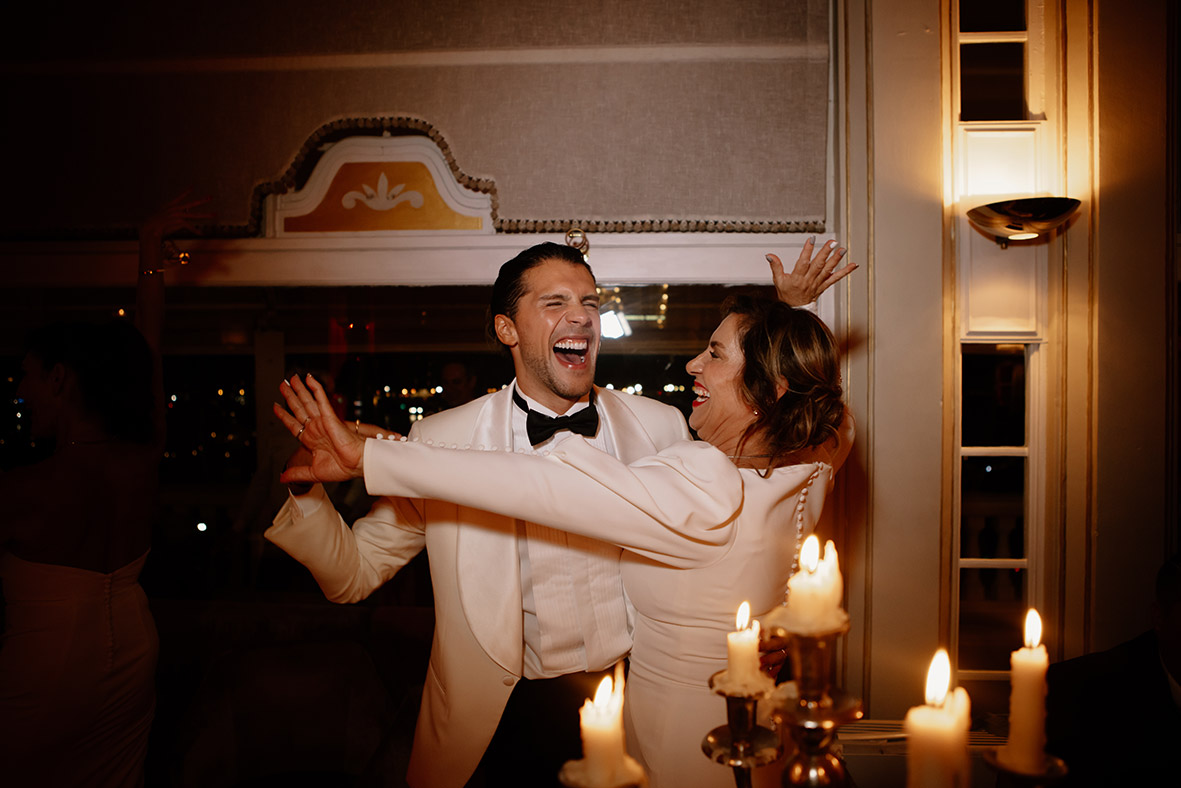 "alt"wedding photographer mallorca mother and son dancing"