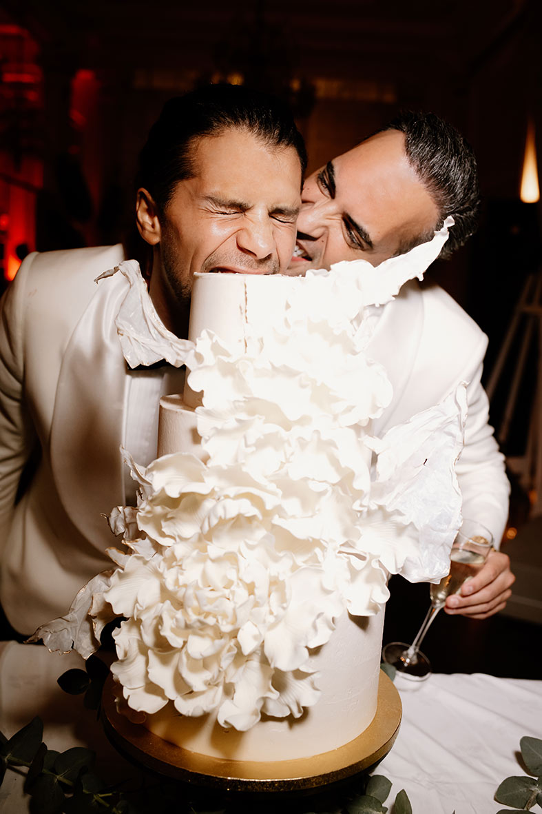 "alt"wedding photographer mallorca biting cake la oca margarita"