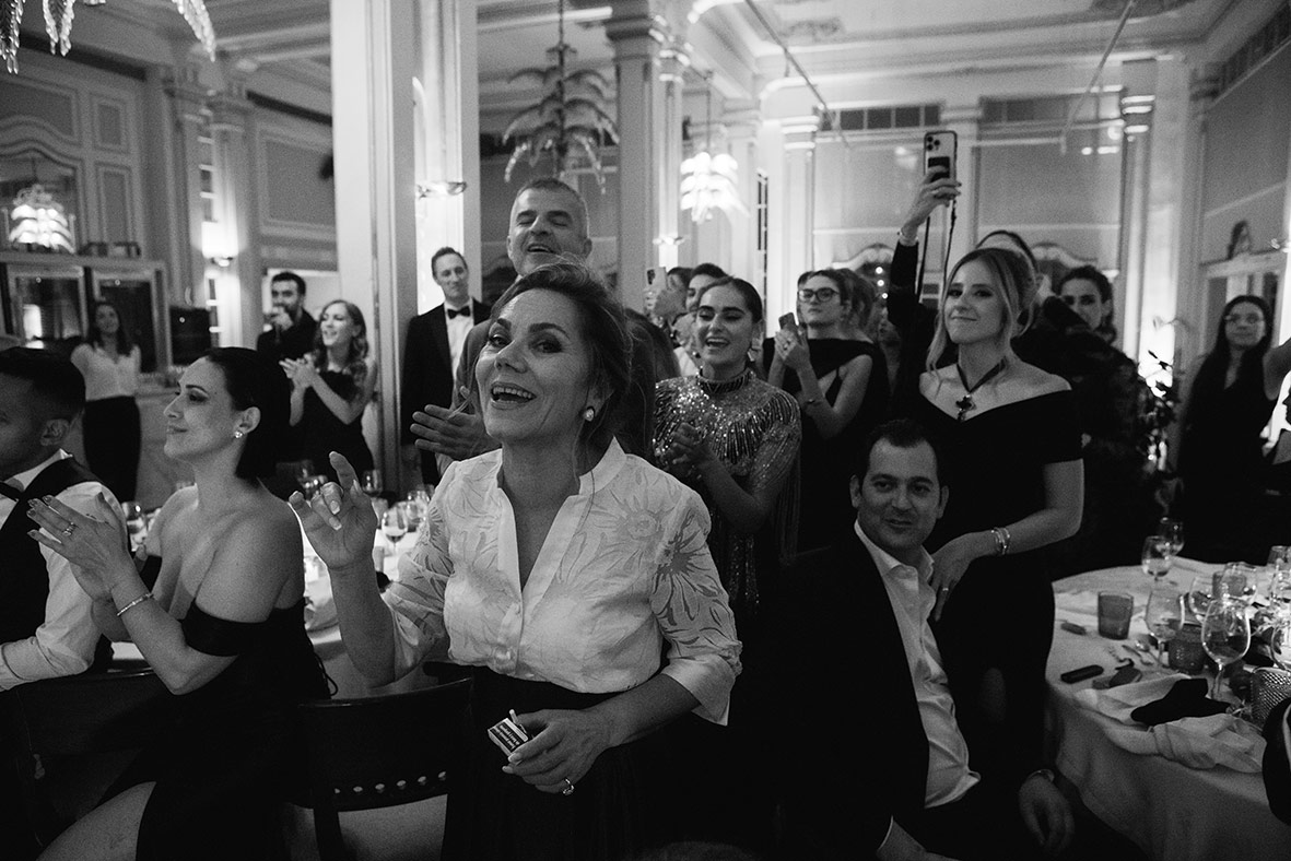 "alt"wedding photographer mallorca guests watching show"